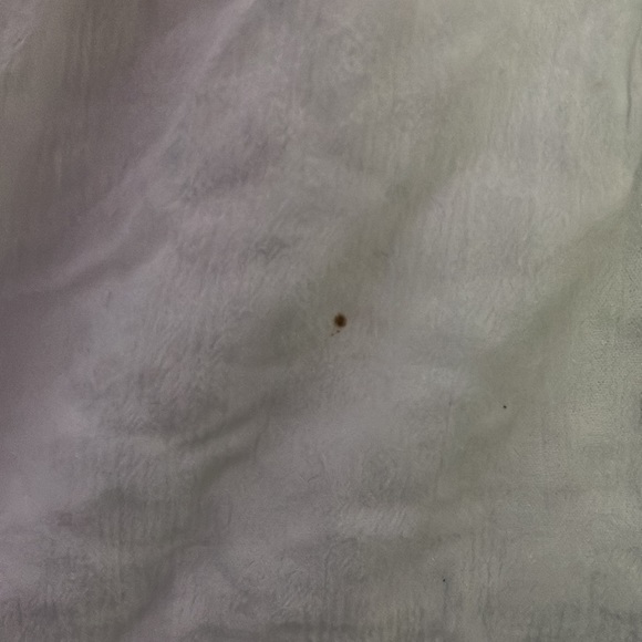 White cute summer shirt has 2 holes and one little non noticeable stain - Picture 4 of 6